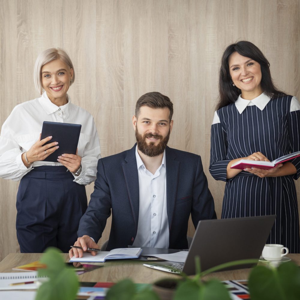 front-view-smiley-people-work-scaled.jpg